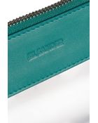 Jil Sander Leather-Trimmed Pvc Clutch - Lyst
