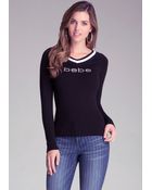 Bebe Double V Athletic Sweater - Lyst