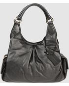 Coccinelle Medium Leather Bags - Lyst