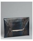BCBGMAXAZRIA Navy Snakeskin Llene Envelope Clutch - Lyst