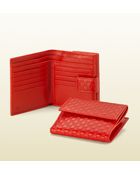 Gucci G Script Charm Flap French Wallet - Lyst