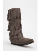 Minnetonka Triple Fringe Boot - Lyst