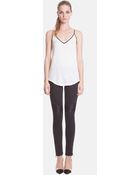 Sandro Piqure Faux Leather Inset Moto Skinny Jeans - Lyst