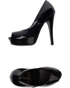 Esclusif Courts With Open Toe - Lyst