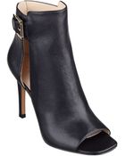 Nine West Kirstey Peep Toe Booties - Lyst
