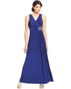 Patra Pleated Embellished Empire-Waist Gown - Lyst