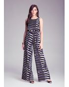 Bebe Print Tie Waist Jumpsuit - Lyst
