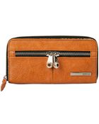 Kenneth Cole Reaction Wooster Street Pvc Zip Around Clutch - Lyst