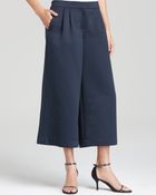 Tibi Pants - Pleated Satin Culottes - Lyst