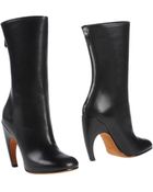 Tod's Ankle Boots - Lyst