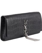 Saint Laurent Croc-Stamped Monogramme Long Clutch - Lyst