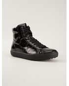 Tod's Logo Embossed Hi-Top Sneakers - Lyst