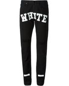 Off-white Logo Print Distressed Jeans - Lyst
