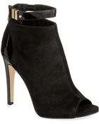 Calvin Klein Saya Buckle Booties - Lyst