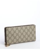 Gucci Beige Gg Coated Canvas Zip Continental Wallet - Lyst