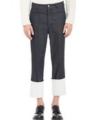 Loewe Cuffed Raw Denim Trousers - Lyst