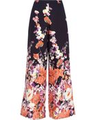 River Island Navy Floral Border Print Palazzo Trousers - Lyst