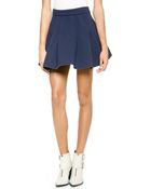 Joa Pleated Neoprene Skirt - Navy - Lyst