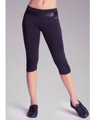 Bebe Shimmer Belt Capris - Lyst