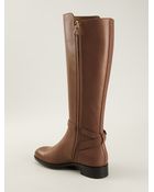 Tod's Buckled Riding Boots - Lyst