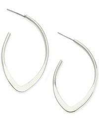 Guess Curved Hoop Earrings - Lyst
