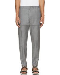 Givenchy Grey Wool Elasticized And Patchworked Trousers - Lyst