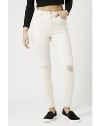 Topshop Moto Ecru Ripped Jamie Jeans - Lyst