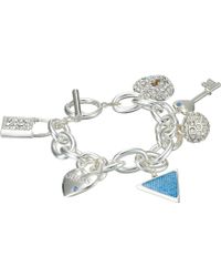 Guess Lock, Key, Hearts Charm Bracelet - Lyst