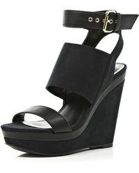 black wedge trainers river island