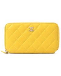Chanel Pre-Owned Quilted Zip Around Wallet - Lyst