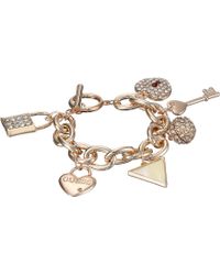 Guess Lock, Key, Hearts Charm Bracelet - Lyst