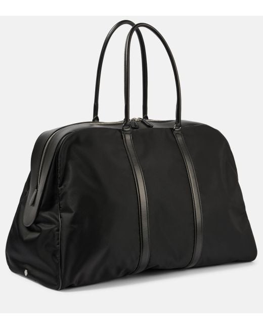 just for you The Row Myles Leather trimmed Duffel Bag in Black