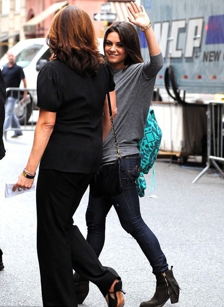 Mila Kunis in AG Adriano Goldschmied Jeans, Acne Boots
