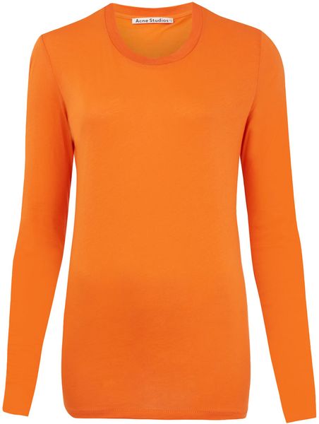 Long sleeve orange top We can't get enough of the Crochet Lace Long Sleeve Off Shoulder Top! This chic off-the-shoulder long-sleeve top with lace detailing on the sleeves is designed in a soft material for maximum comfort.