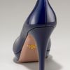 Prada Patent Midheel Pump in Blue - Lyst