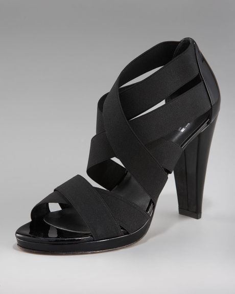 black elastic sandals flat