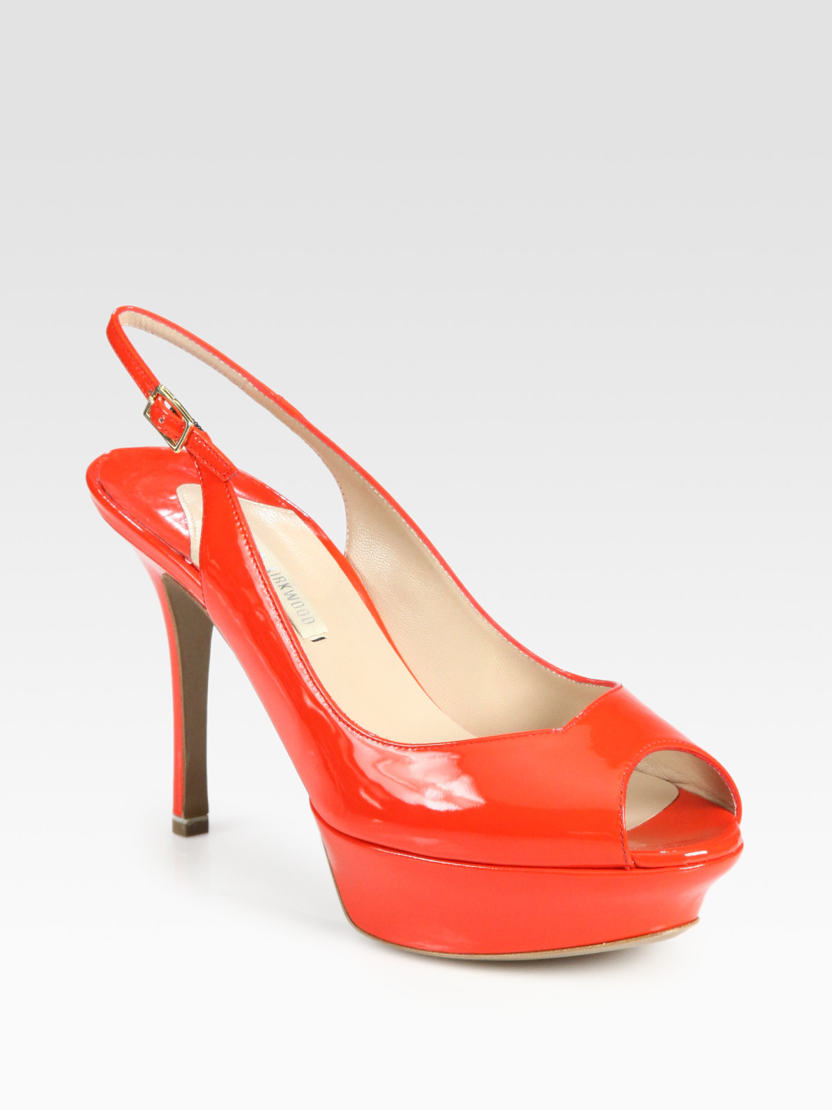 red patent leather open toe pumps