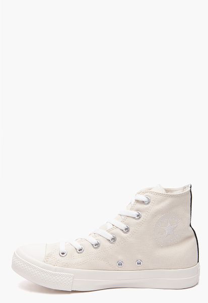 white with red heart converse