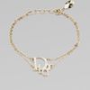 Dior Crystal Accented Signature Logo Bracelet in Gold - Lyst