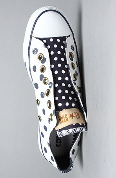 navy blue and white polka dot converse