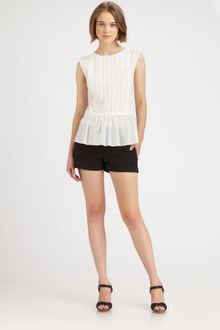 Theory Semi-Sheer Pleated Cotton Peplum Top - Lyst