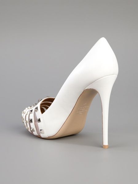 white pumps with studs