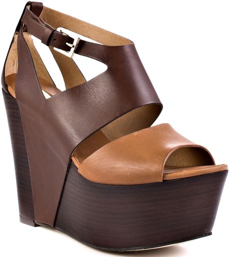 Report Signature Tintle in Brown - Lyst