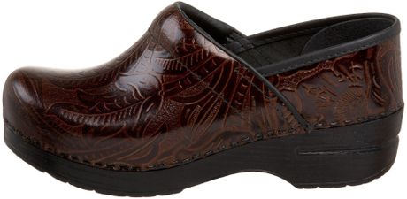 brown tooled dansko clogs