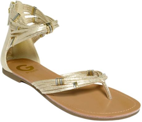 By Guess Lorzi Flat Sandals in (jute gold) | Lyst