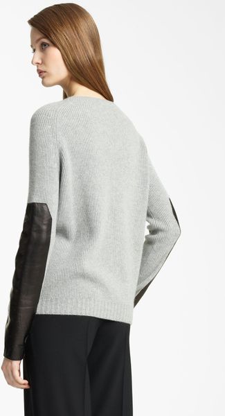 Categories Buy MILLY Women's Black Leather Sleeve Sweater. Similar products also available. SALE now on!