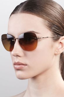 Miu Miu Frameless Oval Sunglasses - Lyst
