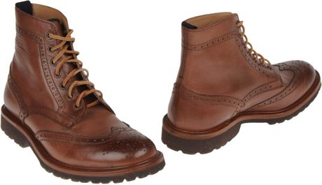 brunello-cucinelli-brown-combat-boots-product-1-4023971-814558626_large_flex.jpeg
