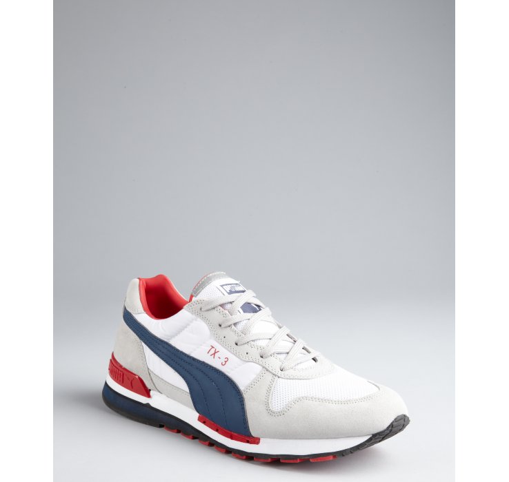 red white and blue puma