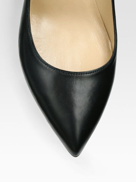 black leather pumps with ankle strap